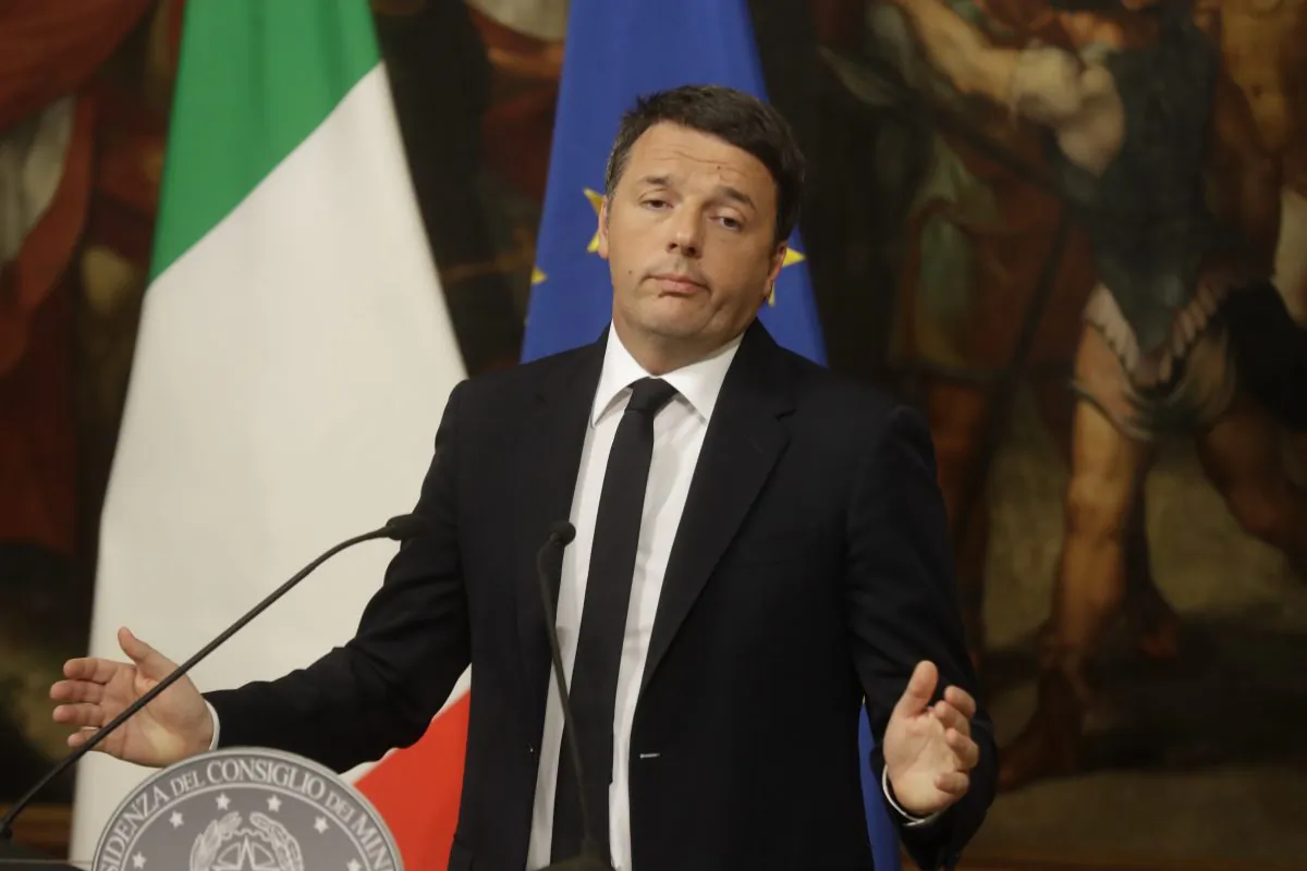 Italian Premier Matteo Renzi speaks during a press conference at the premier's office Chigi Palace in Rome, early on Dec. 5, 2016. Renzi acknowledged defeat in a constitutional referendum and announced he would resign on Monday. Italians voted Sunday in a referendum on constitutional reforms that Premier Matteo Renzi has staked his political future on. (AP Photo/Gregorio Borgia)