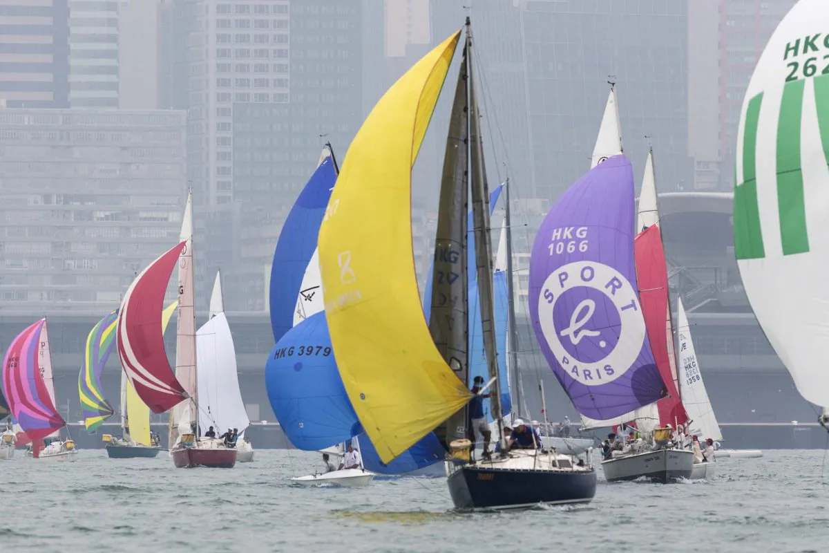 Yachts sailing down wind in the RHKYC's Lipton Trophy race, in Victoria Harbour, on Saturday Dec 3, 2016. (RHKYC/Guy Nowell)