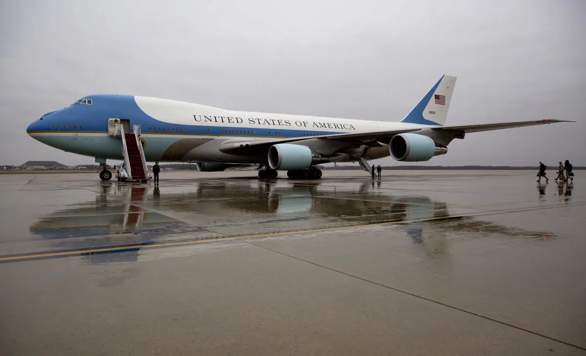 Air Force One is seen on the tarmac at Andrews Air Force Base, Md. before President Barack Obama boards en route to MacDill Air Force Base in Tampa, Fla. on Dec. 6, 2016. President-elect Donald Trump wants the government's contract for a new Air Force One canceled. (AP Photo/Carolyn Kaster)