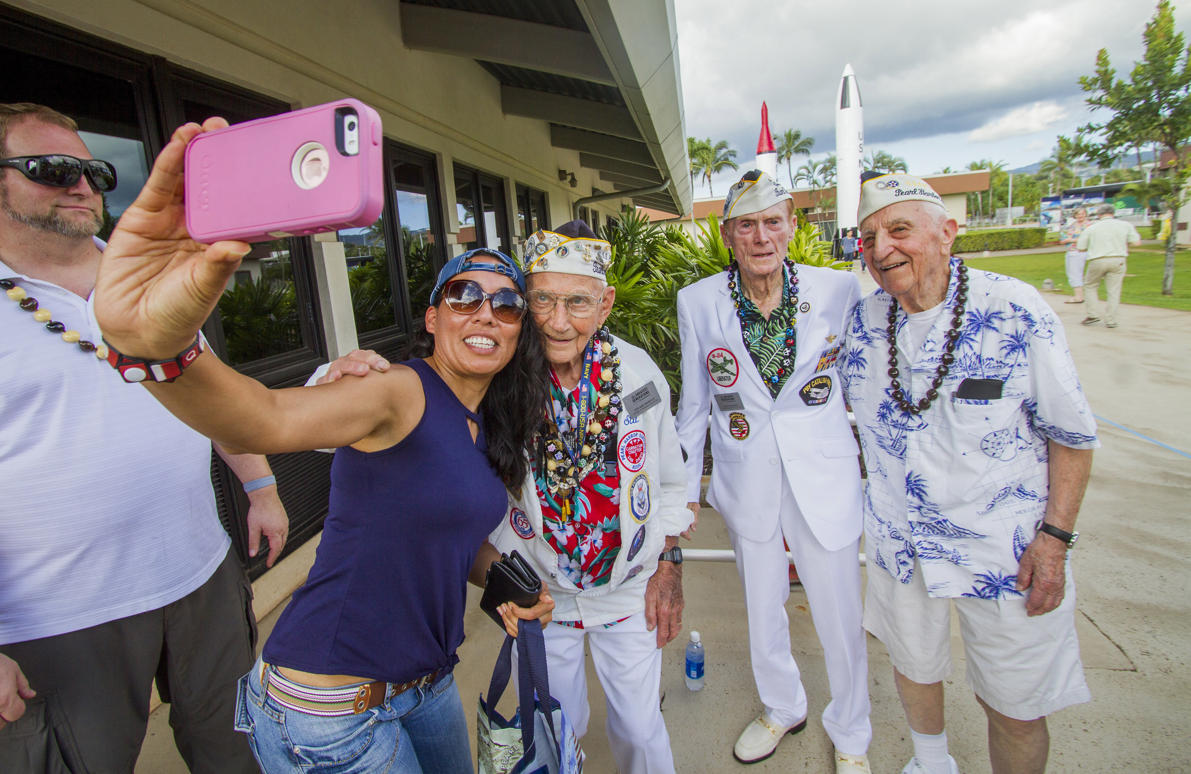 About 30 Pearl Harbor Survivors with the "Greatest Generation" vets meet and greet with visitors at the Pearl Harbor Visitor Center in Honolulu on Dec. 5, 2016. (Dennis Oda/The Star-Advertiser via AP)