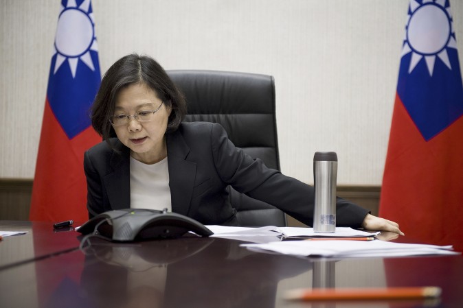 Taiwan's President Tsai Ing-wen speaks with President-elect Donald Trump through a speaker phone in Taipei, Taiwan, on Dec. 2. (Taiwan Presidential Office via AP, File)