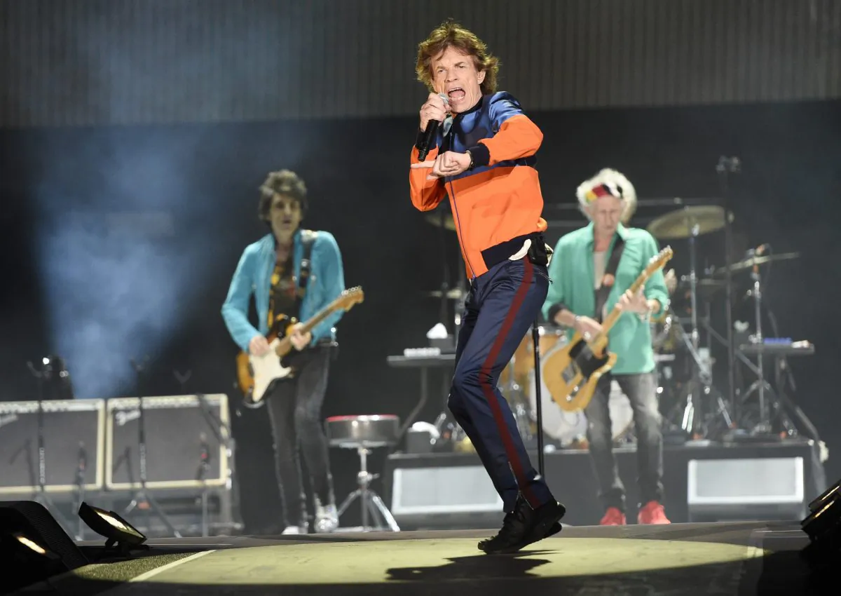 Mick Jagger (C), performs with Ron Wood (L) and Keith Richards of the Rolling Stones during their performance on day 1 of the 2016 Desert Trip music festival at Empire Polo Field in Indio, CA. (Chris Pizzello/Invision/AP)