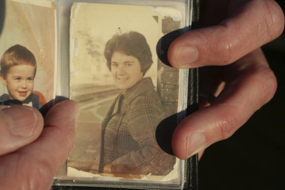 David Penner displays a photograph of his wife, Nancy Penner at Wyckoff's Tree Farm in White Township, N.J., on Dec. 5, 2016. (Andre Malok/NJ Advance Media via AP)