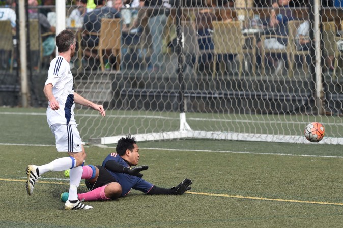 Club Albion score their 2nd goal in their 11-0 win over Colloids FC at Sports Road on Sunday Dec 4, 2016. (Bill Cox/Epoch Times)
