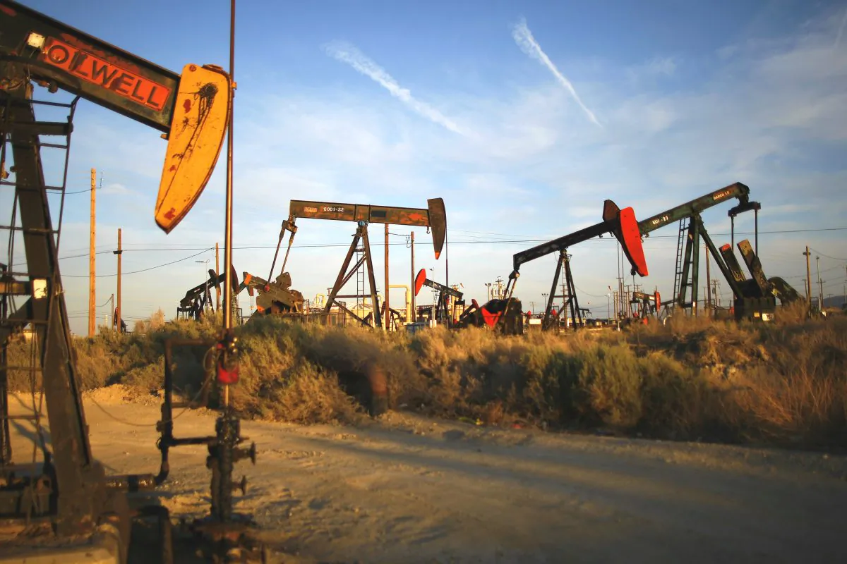 Pump jacks and wells are seen in an oil field on the Monterey Shale formation with gas and oil extraction using hydraulic fracturing, or fracking, on the verge of a boom, near McKittrick, Calif., on March 23, 2014. (David McNew/Getty Images)