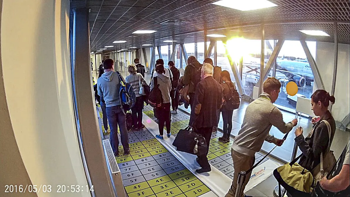 Passengers take their places on the Flying Carpet boarding system during its very first trial on a flight at Pulkovo Airport in St. Petersburg, Russia in which 171 passengers boarded an Airbus A321 in 13 minutes.
(Vlad Kolesnik)
