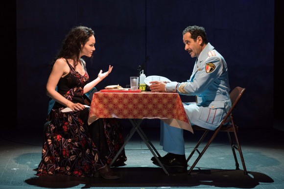 Café owner Dina (Katrina Lenk) and Colonel Tewfiq Zakaria (Tony Shalhoub) discover they have a good deal in common. (Ahron Foster)