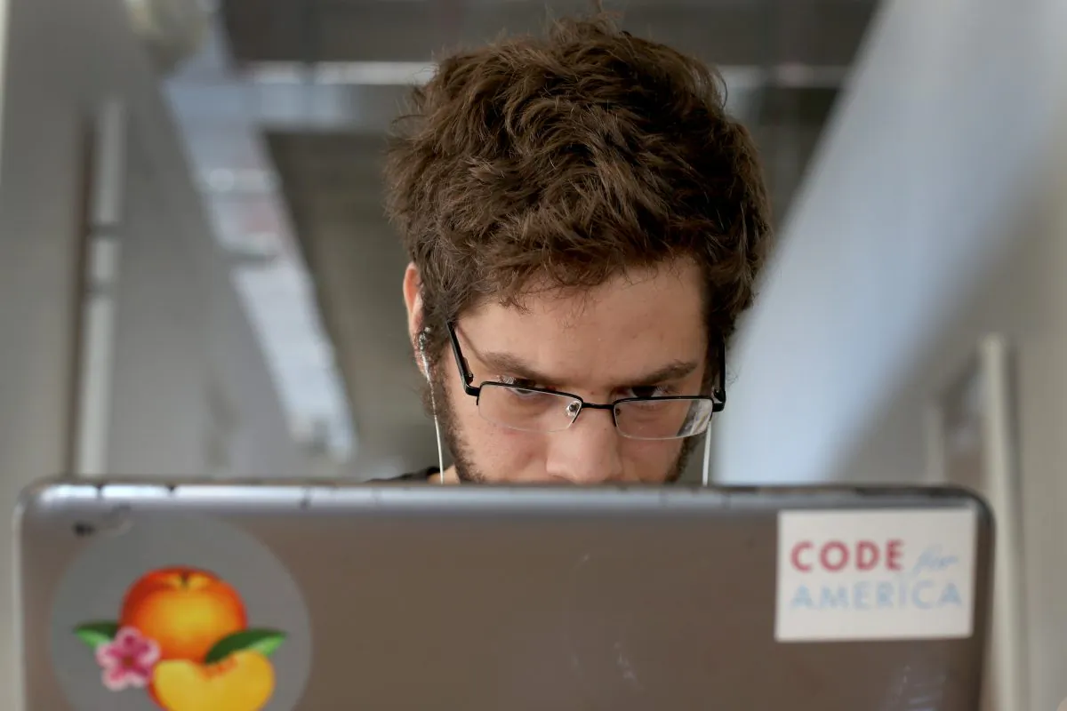A person on laptop in Miami, Fla. in a file photo. (Joe Raedle/Getty Images)