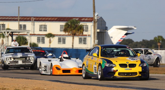 Group E action: The #86 08 BMW M3/GT4 of Jeremy Cooke and Mike Dowd leads Miguel Vidal's #32 1996 Toyota WSR, the two 1967 Camaros of  Grahame and Oliver Bryant, and Ben and Chris Beighton and Alec Hammond, Kathy Blaha's #14 1974 Porsche 911 RSR, Chris Beighton and Alec Hammond 1966 Ford Mustang 2+2. (Chris Jasurek/Epoch Times)