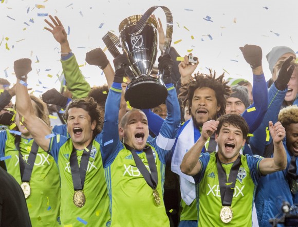 Seattle Sounders players celebrate after winning MLS Cup over Toronto FC in a sudden-death penalty shootout in Toronto on Dec. 10, 2016. (The Canadian Press/Frank Gunn)