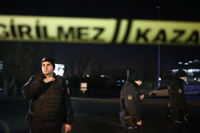 Turkish police officer cordon off the roads leading to the area of the Besiktas football club stadium, in Istanbul, late Saturday, Dec. 10, 2016. Two loud explosions have been heard near the newly built soccer stadium and witnesses at the scene said gunfire could be heard in what appeared to have been an armed attack on police. Turkish authorities have banned distribution of images relating to the Istanbul explosions within Turkey. (AP Photo/Emrah Gurel) TURKEY OUT