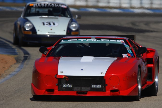 Maurizio and Marco Micangeli and Mauro Borella's #3 1972 De Tomaso Pantera leads Gilles Boyer and Frank Rave's 1973 Porsche 911 RS. (Chris Jasurek/Epoch Times)