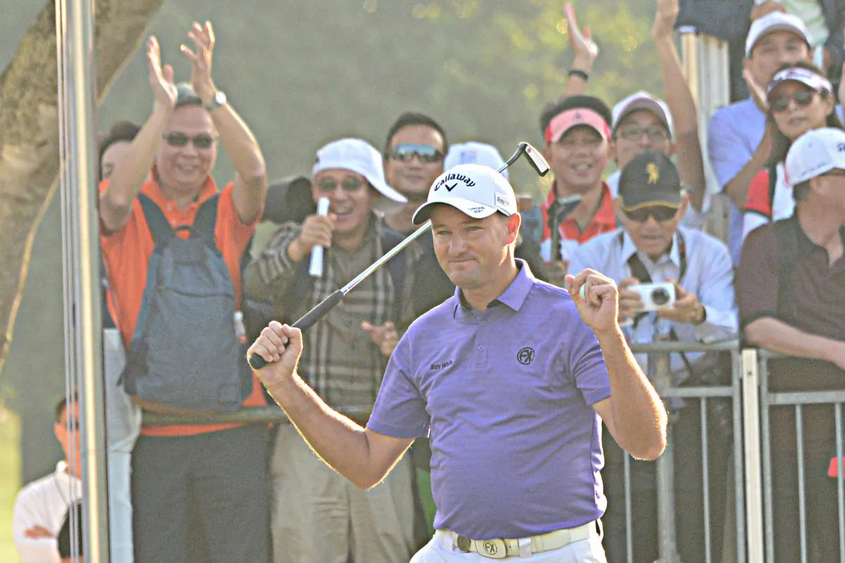 Sam Brazel celebrates winning the UBS Hong Kong Open on Sunday Dec 11, 20016. (Eddie So)