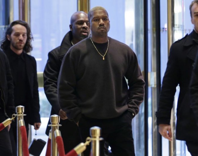Kanye West enters Trump Tower in New York, Tuesday, Dec. 13, 2016. (AP Photo/Seth Wenig)