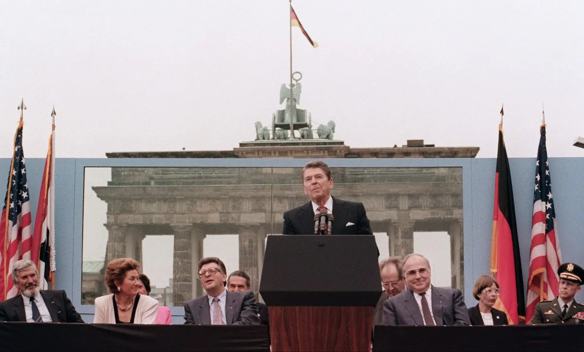 U.S. President Ronald Reagan, commemorating the 750th anniversary of Berlin, addresses the people of West Berlin at the base of the Brandenburg Gate, near the Berlin wall on Jun. 12, 1987. Due to the amplification system being used, the President's words could also be heard on the Eastern (Communist-controlled) side of the wall. "Tear down this wall!" was the famous command from United States President Ronald Reagan to Soviet leader Mikhail Gorbachev to destroy the Berlin Wall. On Nov. 9-11, 1989, the people of a free Berlin tore down that wall. (Mike Sargent/AFP/Getty Images)