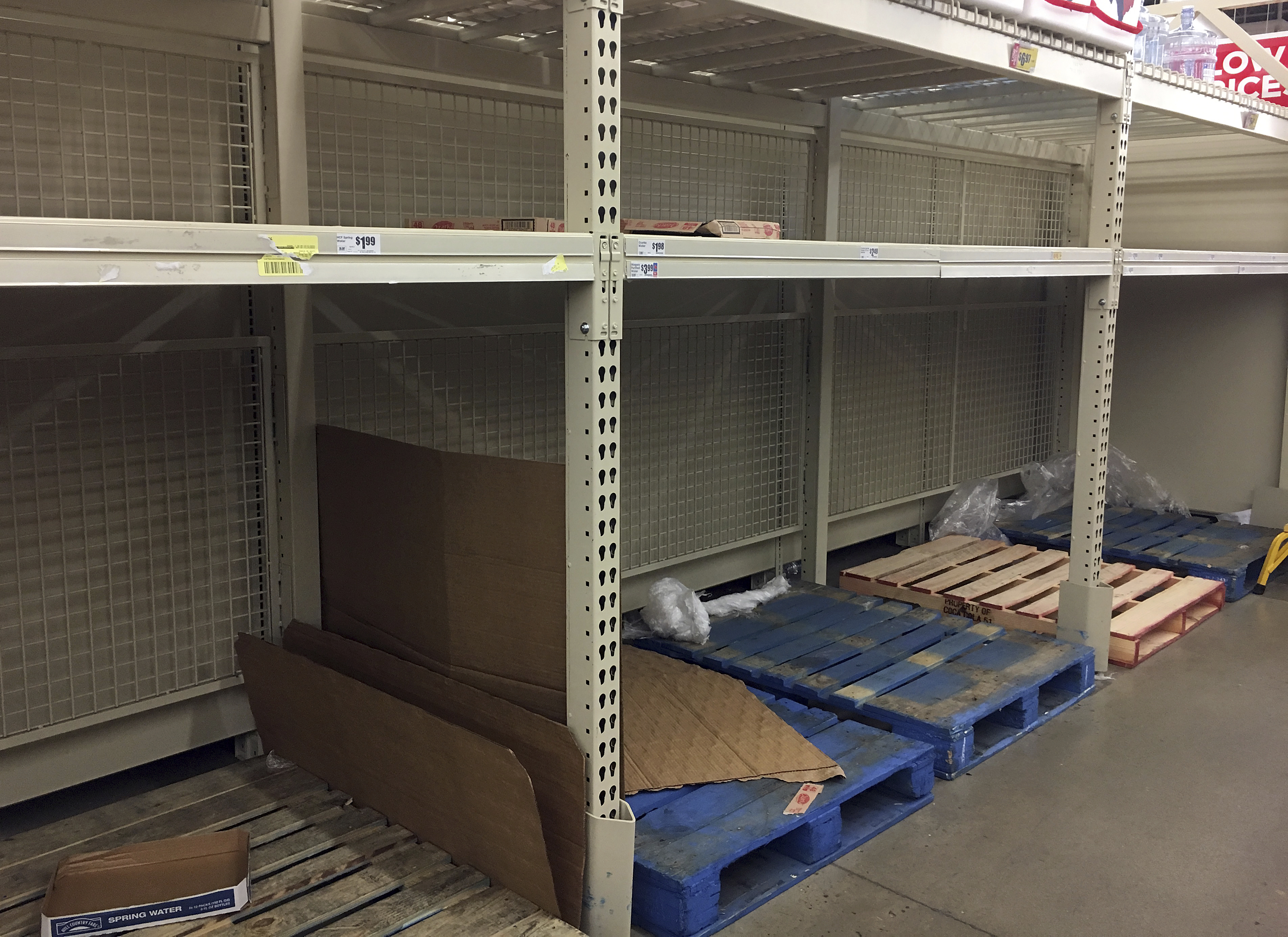 Empty shelves are left after residents rushed to H-E-B to buy water after a recent back-flow incident in the industrial district according to a city news release, in Corpus Christi, TX., on Dec. 15, 2016. (Gabe Hernandez/Corpus Christi Caller-Times via AP)