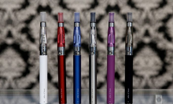 In this file photo, E-cigarettes appear on display at Vape store in Chicago. (Nam Y. Huh/AP Photo)
