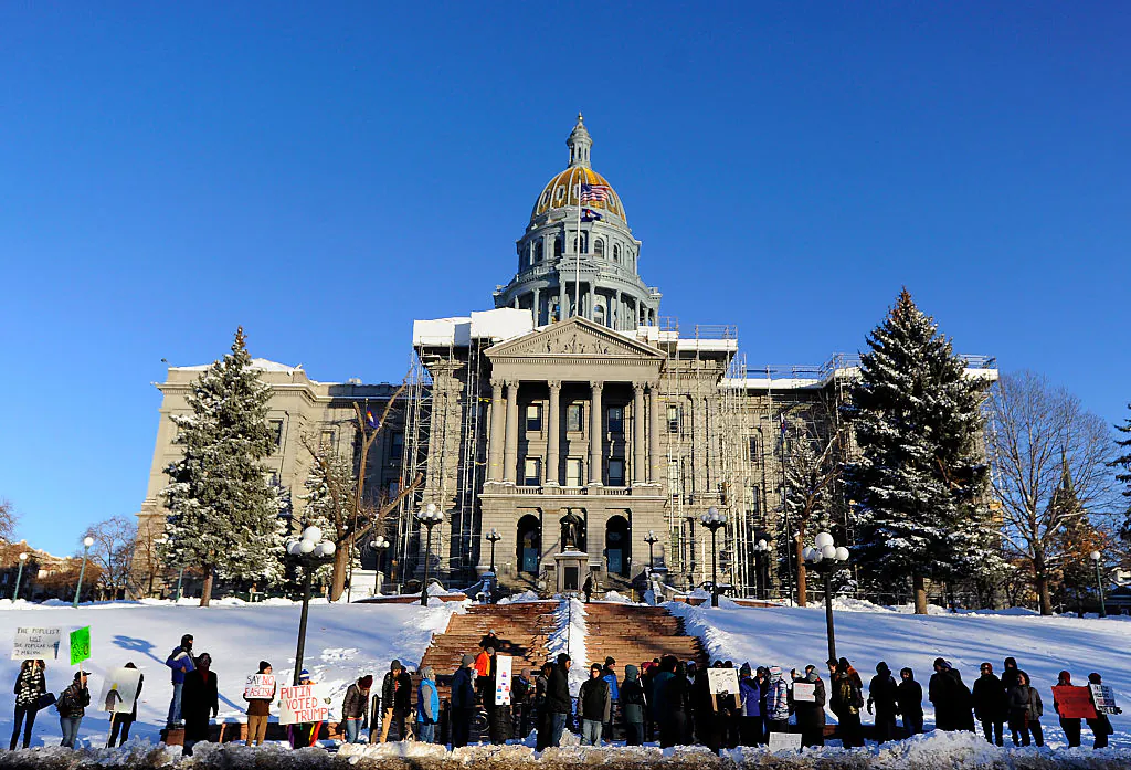 People demonstrate against US President-elect Donald Trump on the eve of the Electoral College vote, in Denver, Colorado on Dec. 18, 2016. (CHRIS SCHNEIDER/AFP/Getty Images)
