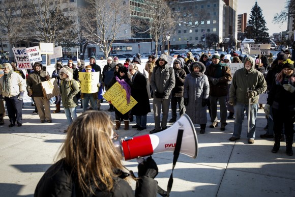 LANSING, MI - DECEMBER 19: Protestors rally at the Michigan State Capitol before the state electoral college met to cast their votes on December 19, 2016 in Lansing, Michigan, United States. The electoral college met in the afternoon and voted unanimously for Trump. Electors from all 50 states cast votes today in their respective state capitols. (Photo by Sarah Rice/Getty Images)
