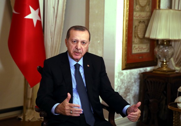 Turkey's President Recep Tayyip Erdogan, talks regarding the Russian ambassador Andrei Karlov's assassination at the Presidential palace in Ankara, Turkey, on Dec. 19, 2016. (Press Presidency Press Service via AP, Pool)