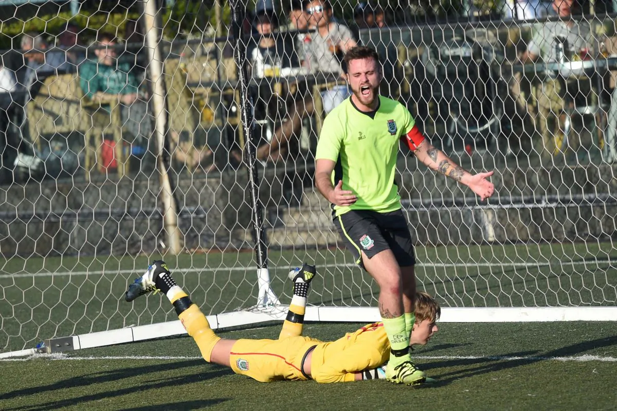 KCC Knights captain distraught as Wanderers score their first goal in their Division 1 game of the Yau Yee League on Sunday Dec 18, 2016. (Bill Cox/Epoch Times)