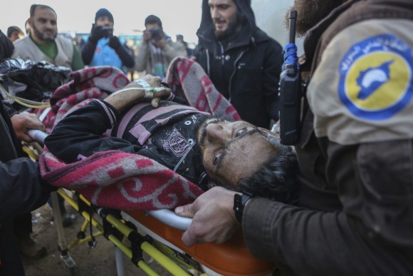 An injured Syrian arrives at a refugee camp in Rashidin, near Idlib, Syria, after was evacuated from the embattled Syrian city of Aleppo during the ceasefire, Tuesday, Dec. 20, 2016. Russian Foreign Minister Sergey Lavrov said on Tuesday that Russia, Iran and Turkey are ready to act as guarantors in a peace deal between the Syrian government and the opposition. He spoke on Tuesday after a meeting of the three countries' foreign ministers in Moscow. (AP Photo)