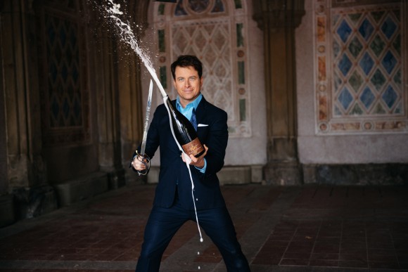 If there's an ultimate way to open a bottle of bubbly, this is it. Mark Oldman sabered over 30 bottles in Central Park last spring for a photo shoot for his book cover. When he gave the sabered bottles away to passersby, half were suspicious, and half were delighted.