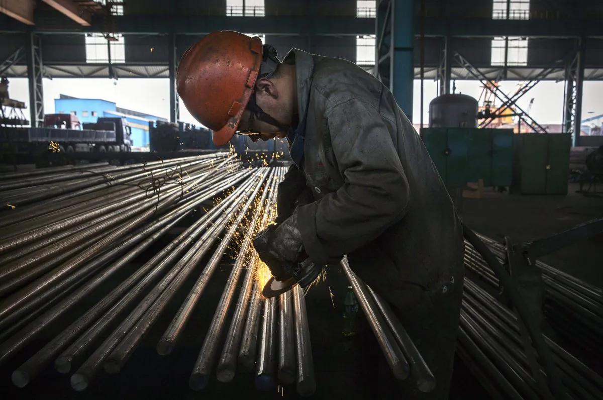 A worker in Changzhou, China’s Jiangsu Province, on May 13, 2016. (Kevin Frayer/Getty Images)