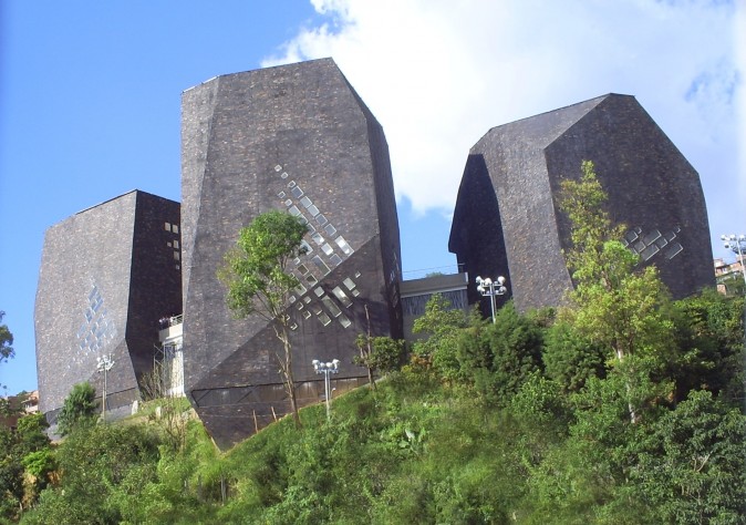 The España Library, whose three buildings are meant to resemble black stones that are illuminated at night. (SajoR/Wikimedia Commons)