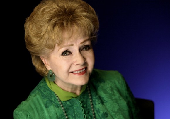 In this file photo, actress Debbie Reynolds poses for a portrait in New York. (AP Photo/Richard Drew, File)