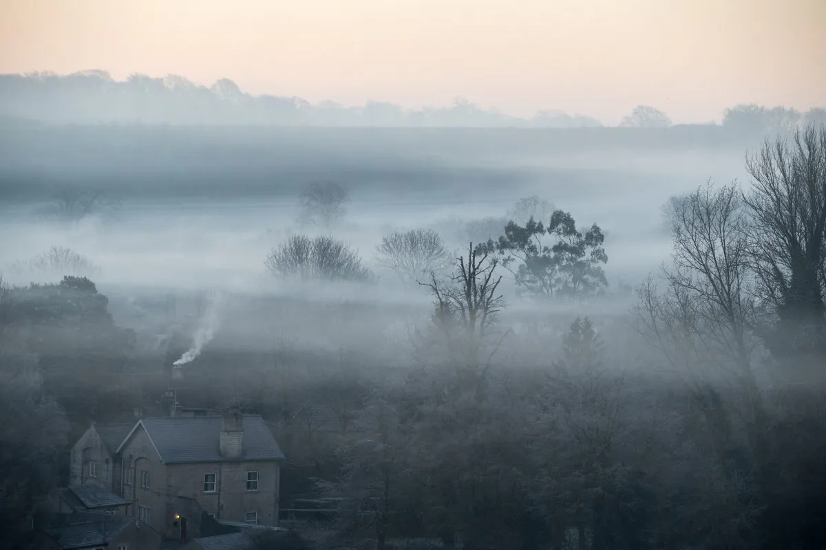 Early morning fog and mist lingers as the sun rises over the village of Kilmersdon, England, on Dec. 29, 2016. (Matt Cardy/Getty Images)