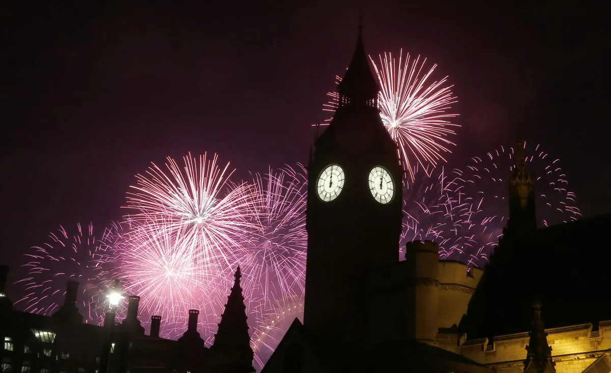 Fireworks explode over Elizabeth Tower housing the Big Ben clock to celebrate the New Year in London, on Jan. 1, 2017.(AP Photo/Frank Augstein)