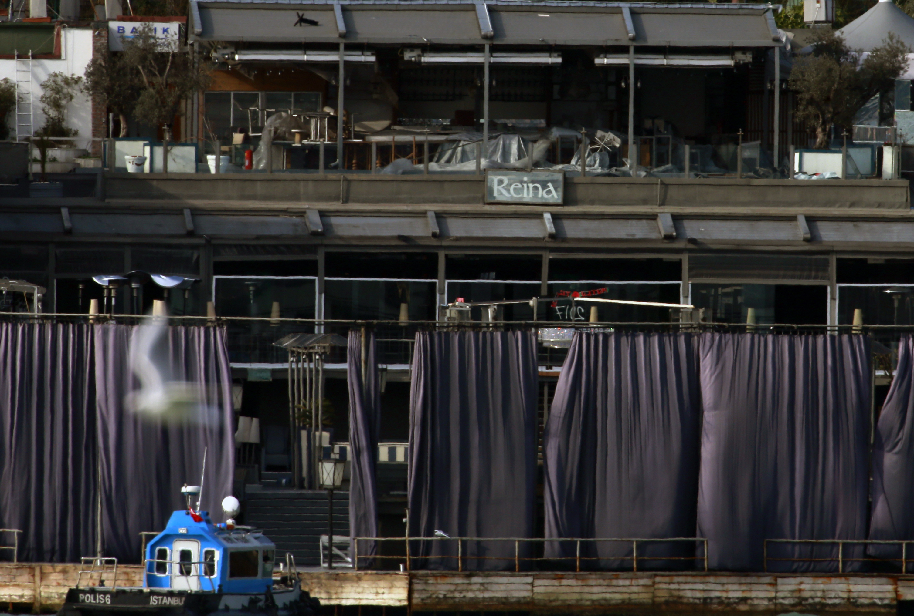 A view of a nightclub by the Bosphorus, which was attacked by a gunman overnight, in Istanbul, on New Year's Day, Sunday, Jan 1, 2017. An assailant believed to have been dressed in a Santa Claus costume and armed with a long-barrelled weapon, opened fire at the nightclub in Istanbul's Ortakoy district during New Year's celebrations, killing dozens of people and wounding dozens of others in what the province's governor described as a terror attack. (AP Photo/Emrah Gurel)