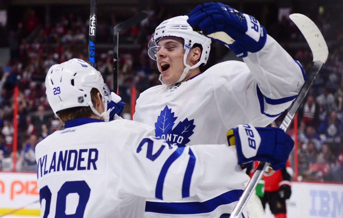 Toronto Maple Leafs centre Auston Matthews celebrates a goal with William Nylander against the Ottawa Senators in Ottawa on Oct. 12, 2016. (The Canadian Press/Sean Kilpatrick)