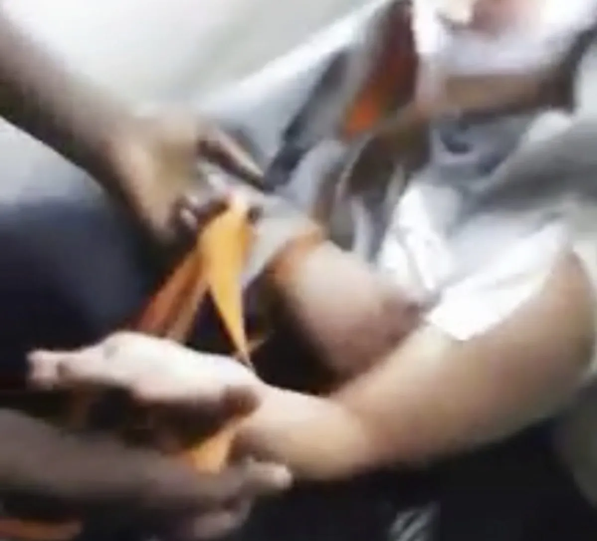 A frame in which a man (R) is assaulted in Chicago.(Vidme via AP)