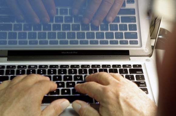 If the government is to successfully fend off cyberthreats it must partner with the private sector and the United States, warns a federally commissioned report. (AP Photo/Damian Dovarganes)