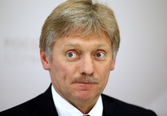 Russian President Vladimir Putin's press secretary Dmitry Peskov listens for a question during his news conference at the ASEAN Russia summit, in the Black Sea resort of Sochi, Russia, in this file photo. (AP Photo/Alexander Zemlianichenko)