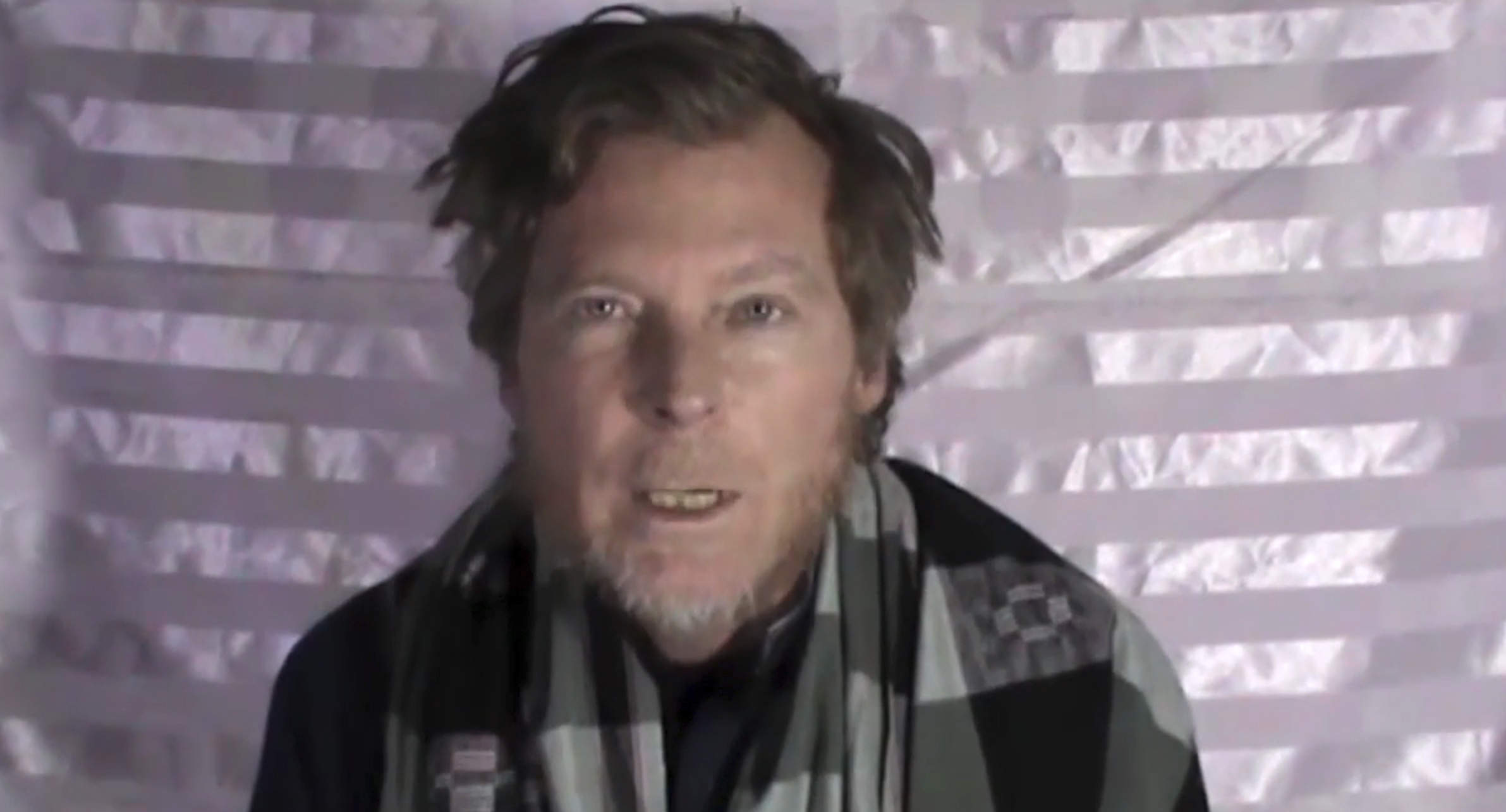 An Australian identified as Timothy Weekes making a statement on camera while in captivity. (militant video via AP)