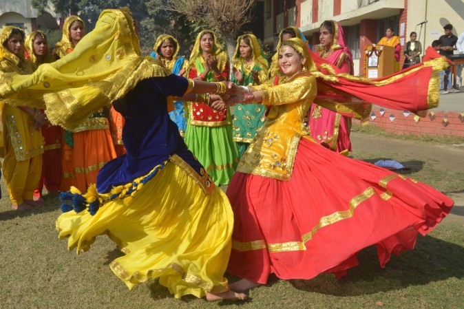 Young Indian students wear traditional Punjabi dress as they perform the 'Giddha' dance during celebrations on the occasion of the Lohri Festival in Amritsar on Jan. 13, 2017. (Narinder Narinder/AFP/Getty Images)