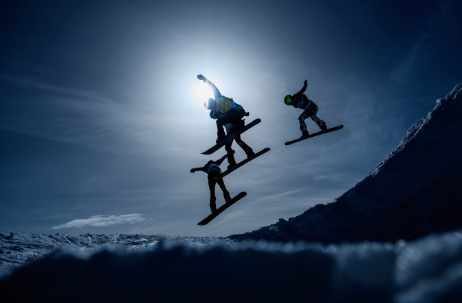 Nelly Moenne Loccoz of France, Michela Moioli of Italy, Faye Gulini of the Unites States and Charlotte Banke of France compete in the Women Small Final during the Snowboard Cross World Cup on Feb. 12, in Hinterzarten, Germany. (Matthias Hangst/Bongarts/Getty Images)