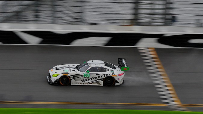 The #50 Riley Motorsports-WeatherTech Racing Mercedes AMG GT3 tests its limits on the wet track. (Bill Kent/Epoch Times)