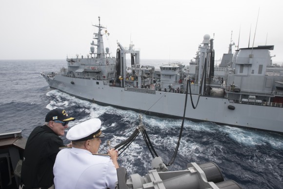 Secretary of the Navy (SECNAV) Ray Mabus, left, observes an underway replenishment with Adm. Giuseppe De Giorgi, chief of the Italian navy, while aboard the guided-missile destroyer USS Mason (DDG 87) on June 16, 2016. This was the U.S. Navy's first replenishment where the fuel was made from alternative sources and transferred from a partner nations ship. The Italian navy auxiliary ship ITS Etna (A5326) provided Mason with biofuel, made from waste fat beef and inedible vegetable oil, as part of the Great Green Fleet initiative. (Armando Gonzales/US Navy/Getty Images)