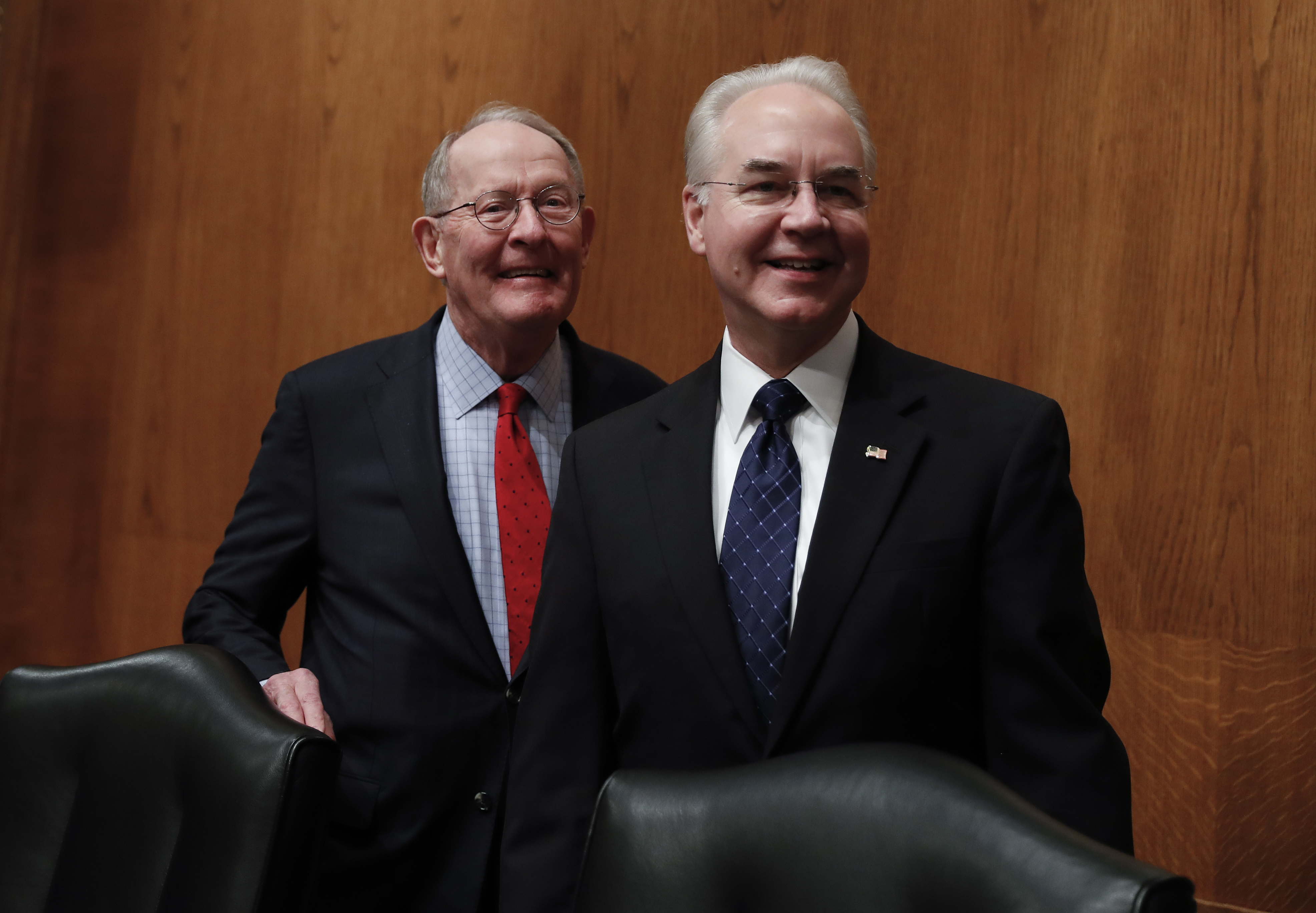 Senate Health, Education, Labor and Pensions Committee Chairman Sen. Lamar Alexander, R-Tenn. (L) stands with Health and Human Services Secretary-designate, Rep. Tom Price, R-Ga. on Capitol Hill in Washington on Jan. 18, 2017. (AP Photo/Carolyn Kaster)