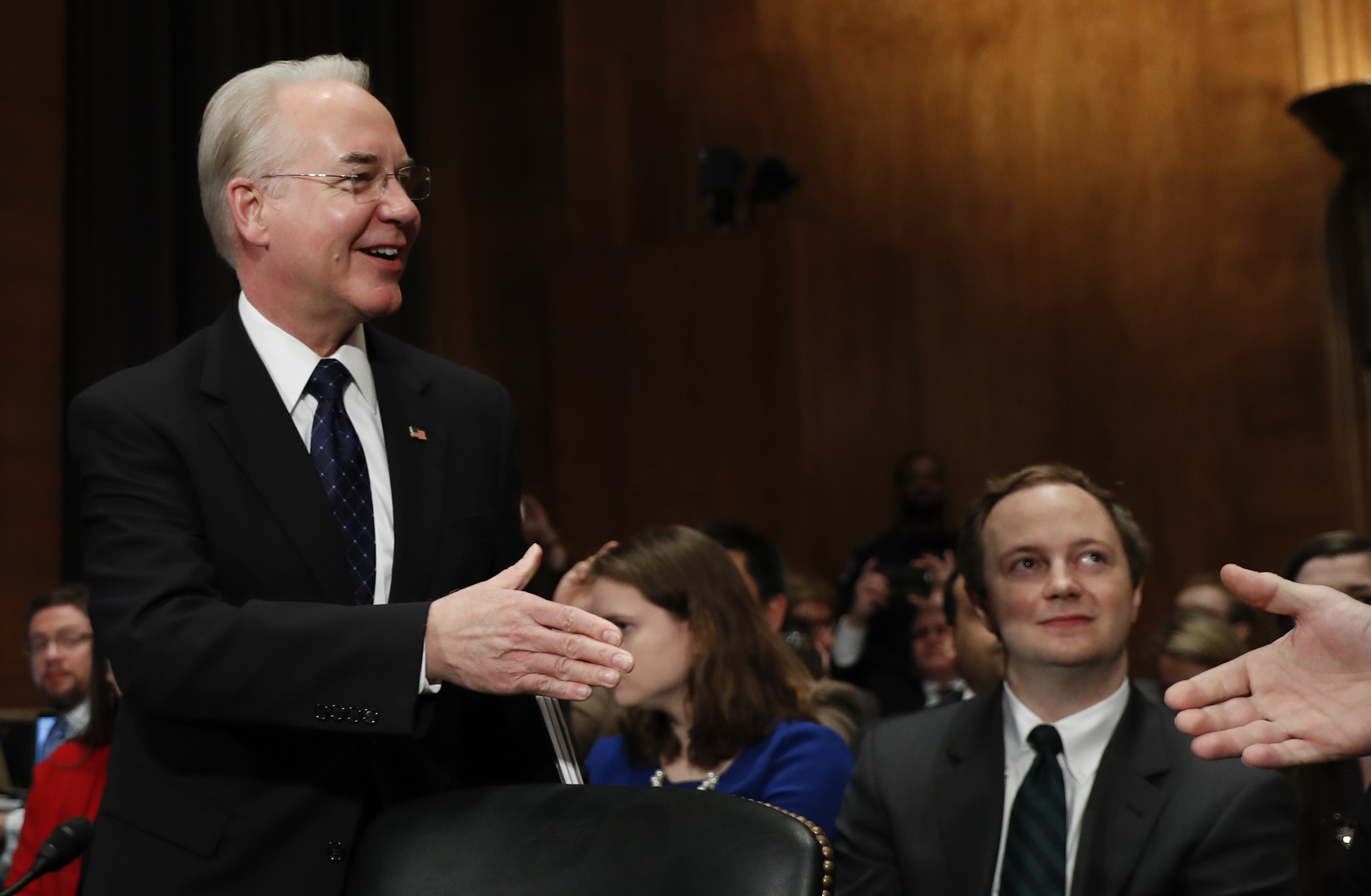 Health and Human Services Secretary-designate, Rep. Tom Price, R-Ga. (L) is greeted on Capitol Hill in Washington on Jan. 18, 2017, prior to testifying his confirmation hearing before the Senate Health, Education, Labor and Pensions Committee. (AP Photo/Carolyn Kaster)