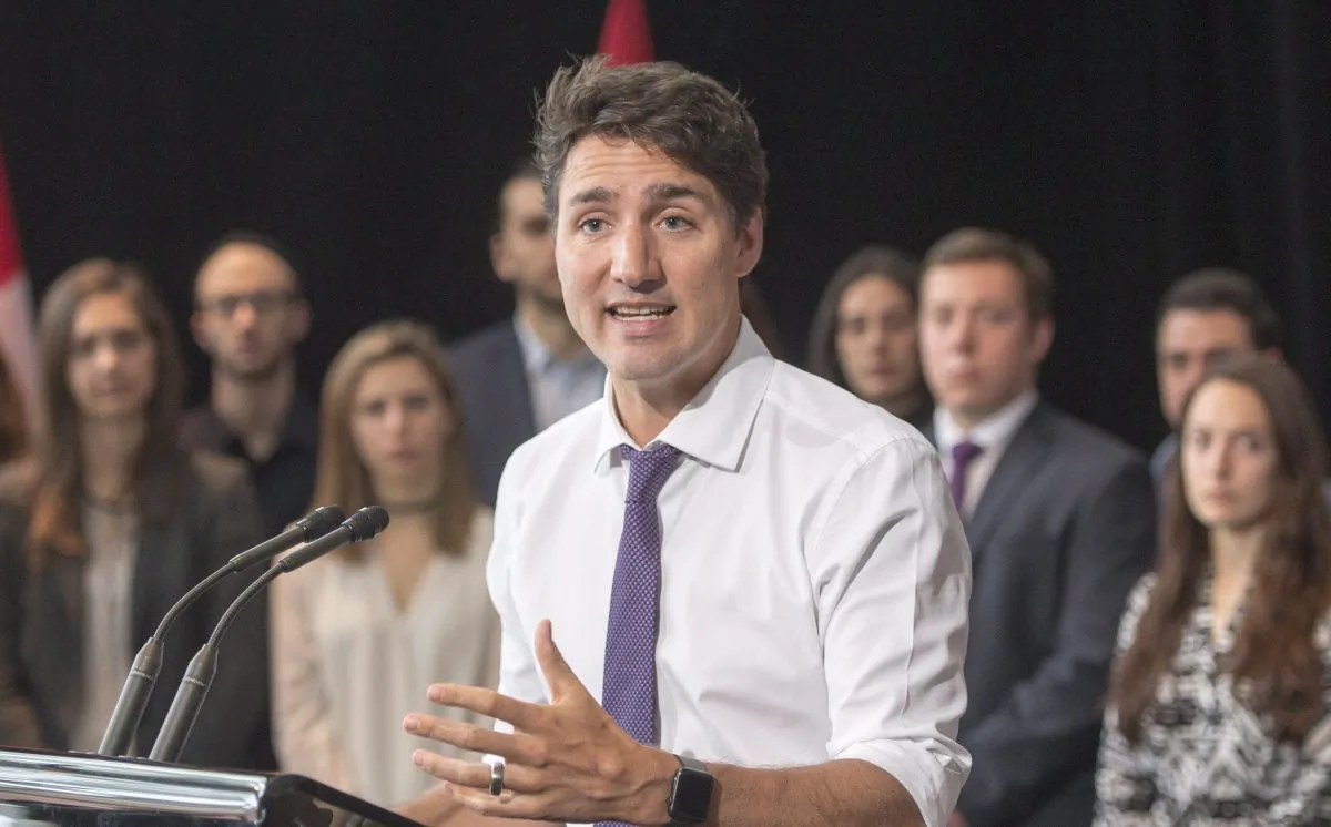 Prime Minister Justin Trudeau speaks to media during a press conference at Bishop's University in Sherbrooke, Quebec, on Jan. 18, 2017. (The Canadian Press/Ryan Remiorz)