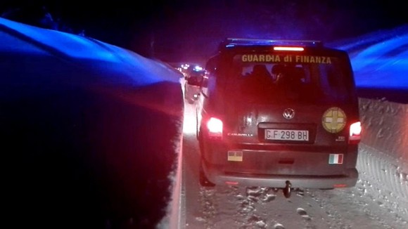 Rescuers make their way to the hotel hit by an avalanche in Farindola, Italy, on Jan. 19, 2017. (Italian Finance Police via AP)