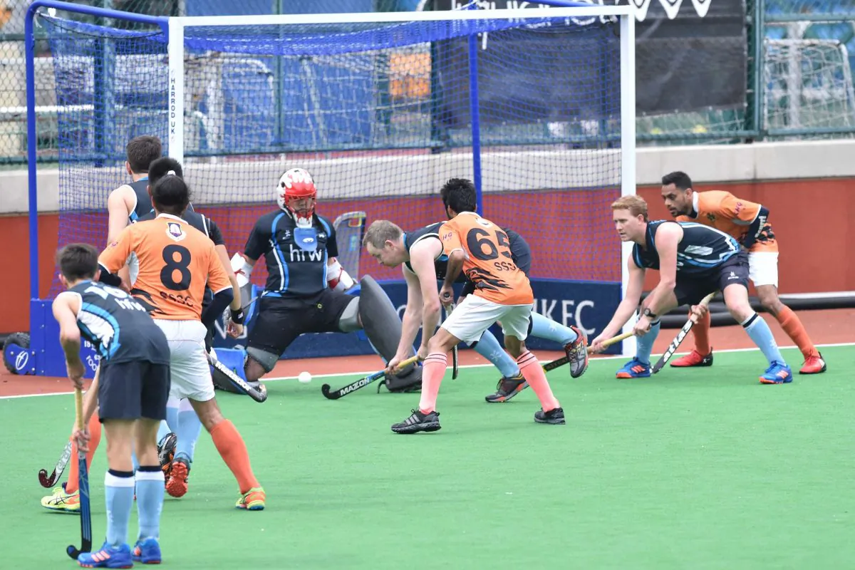 SSSC-A on the attack against HKFC-A in the first half of the HKHA Premier Group A match at HKFC on Sunday Jan 15 in a thrilling match, HKFC won 3-1 to move into the joint lead in the league on 28 points. (Bill Cox/Epoch Times)