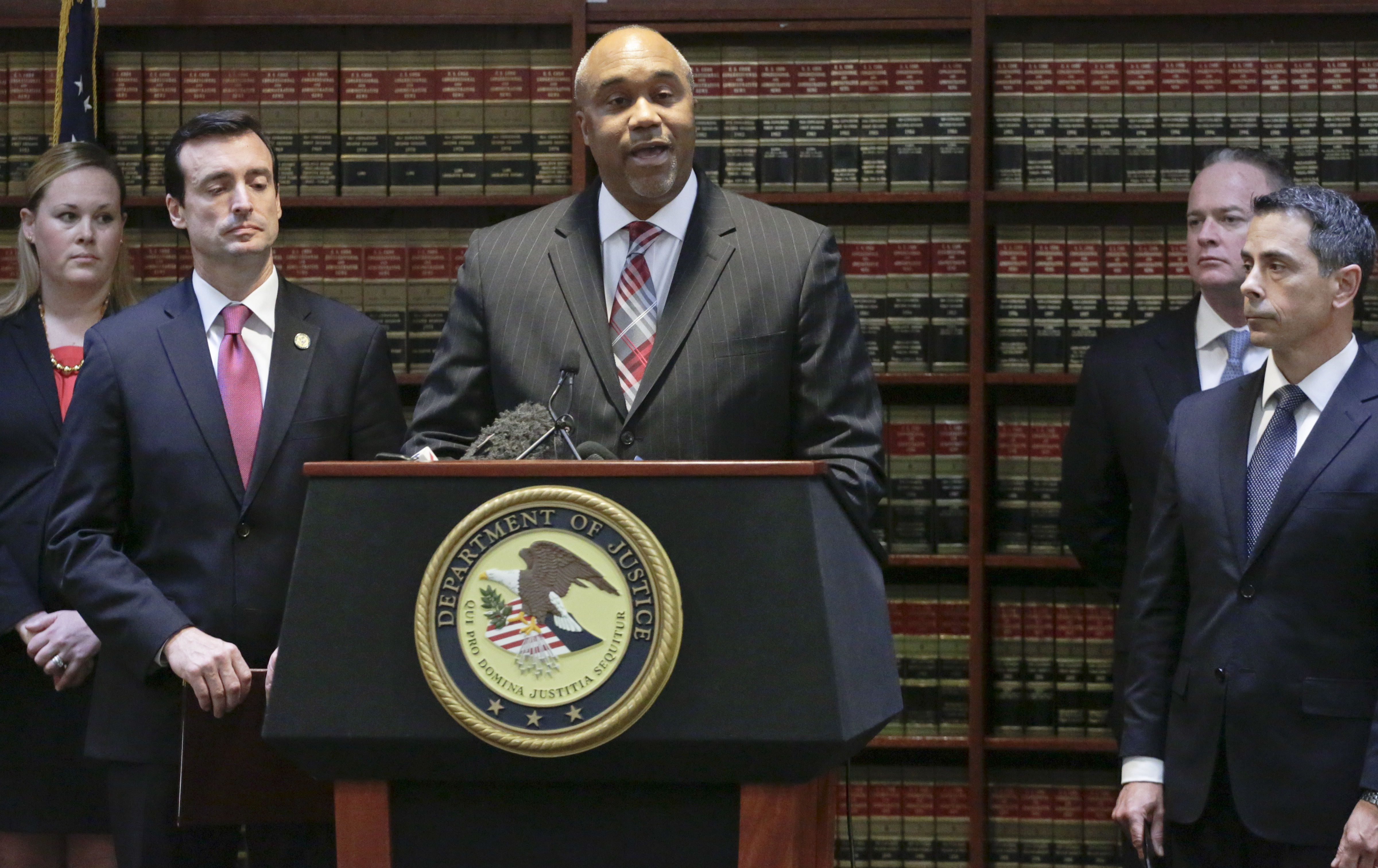 U.S. attorney Robert Capers (C) during a news conference, announcing charges for Mexican drug kingpin Joaquin "El Chapo" Guzman as the murderous architect of a three-decade-long web of violence, corruption and drug trafficking in the Brooklyn borough of New York on Jan. 20, 2017. (AP Photo/Mark Lennihan)