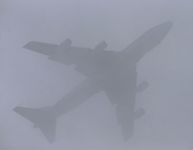 Former President Barack Obama's plane flies over Palm Springs International Airport and is diverted to March Air Reserve Base after bad weather prevented him and his family from landing at Palm Springs International Airport in Palm Springs, Calif., Friday, Jan. 19, 2017. Obama left Washington after attending President Donald Trump's morning inauguration. (Frank Bellino/The Press-Enterprise via AP)