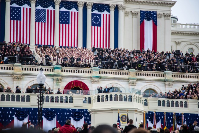 Vice President Mike Pence and his wife Karen Pence, wave after being sworn in during the 58th Presidential Inauguration at the U.S. Capitol in Washington, on Jan. 20, 2017. (Benjamin Chasteen/Epoch Times)